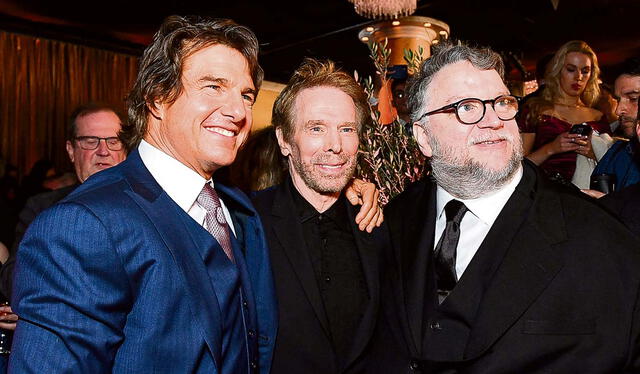 Con Jerry Bruckheimer y Guillermo del Toro. Foto: AFP   