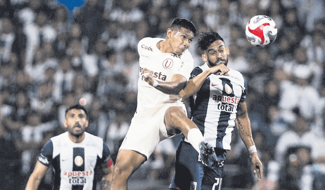  Disputa. Flores y Andrade luchando por el balón. Foto: difusión    