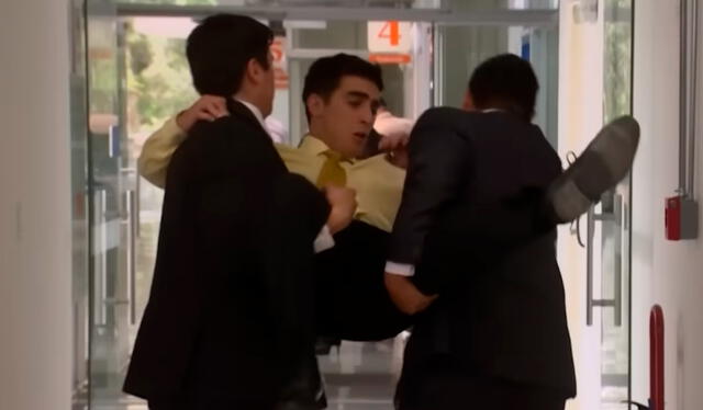 Luego de descubrirse la agresión a Remo, personal de seguridad de la Corporación Maldini retiró a 'Jimmy' del edificio. Foto: América TV   