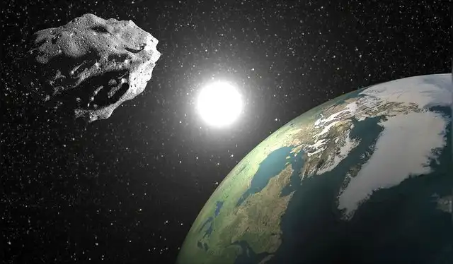  Ilustración de un asteroide orbitando el Sol junto a la Tierra, similar a la posible nueva cuasiluna. Foto: Alamy Stock   