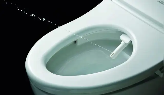 El Washlet en acción lanzando un chorro de agua