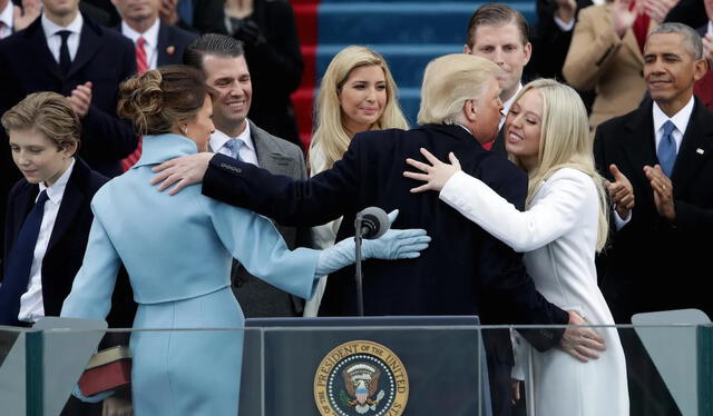 Trump with his wife and his daughter in the 2017 inauguration ceremony. Photo: AFP.   