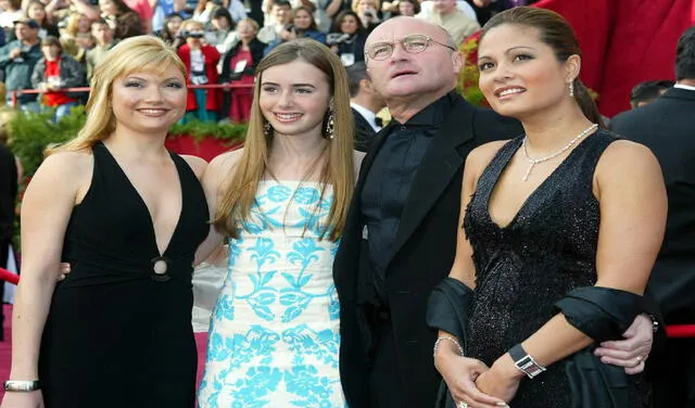Phil Collins en foto del 2004 junto a sus hijas Joely y Lily (izq) y su esposa Orianne. (Foto: EFE)