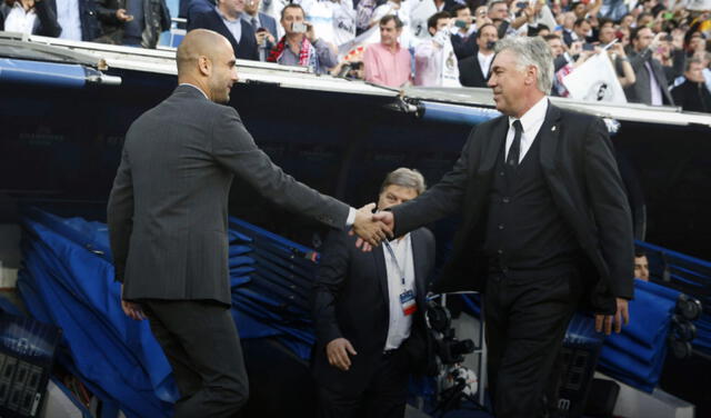 Josep Guardiola y Carlo Ancelotti previo al Real Madrid vs. Bayern Munich del 2014. Foto: EFE