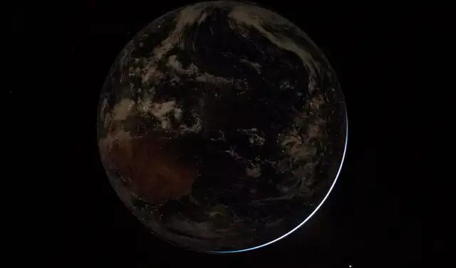 Foto con resplandor del sol que se filtra a través de los contornos de la Tierra en la oscuridad. Foto: NASA Foto con resplandor del sol que se filtra a través de los contornos de la Tierra en la oscuridad. Foto: NASA