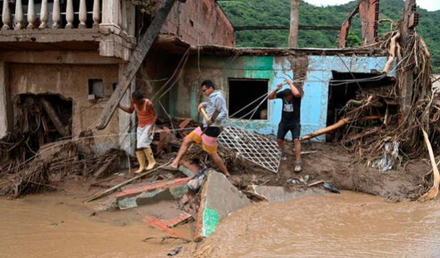 La llegada de un ciclón tropical empeoraría gravemente la situación de miles de venezolanos, quienes ya se encuentran enfrentando el paso de ondas tropicales. Foto: AFP.