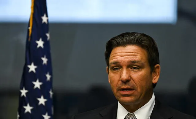  Florida Governor, Ron DeSantis, signed a new law that endures restrictions on violent dogs. Photo: AFP News    