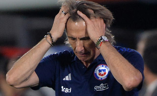 Ricardo Gareca resigns the National Chilean Team after a clause in his contract said that if they do not qualify, he must leave the coach position. Photo. AFP News Ricardo Gareca resigns the National Chilean Team after a clause in his contract said that if they do not qualify, he must leave the coach position. Photo. AFP News