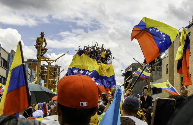 Para saber dónde votar en las elecciones de Venezuela desde el extranjero, debes verificar tu inscripción en el Registro Electoral del Consejo Nacional Electoral (CNE). Foto: AFP.   