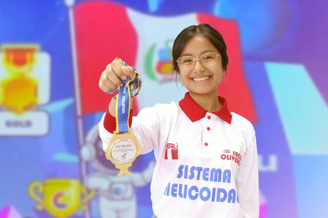  Dhamaris Alarcón y su medalla de oro de la Olimpiada Mundial de Física y Astronomía Copérnico. Foto: Andina   