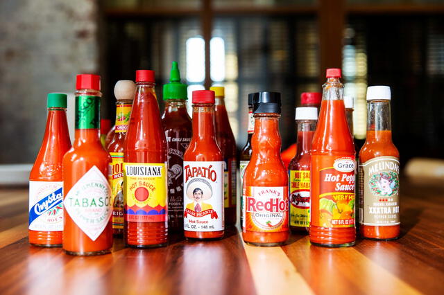 Bottles of hot sauce used as a brutal torture tool during an 18-hour ordeal by Florida drug traffickers, highlighting the cruelty of organized crime. Photo: Jacqueline Stofsick    