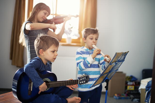 Kids playing music together