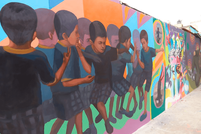 Municipalidad de Magdalena del Mar: artistas pintan mural con los pasos de baile del pequeño ‘Tilín’