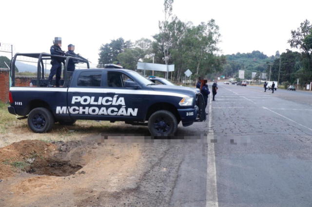 La policía michoacana sospecha que el asesinato de los 12 hombres se trate de un ajuste de cuentas entre bandas de narcotraficantes. (Expansión Política)
