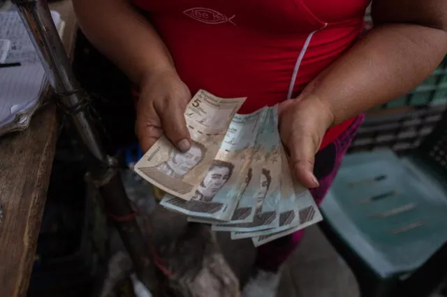 Venezuela registra el salario mínimo más bajo de América Latina, con solo 3,61 dólares. Foto: AFP   