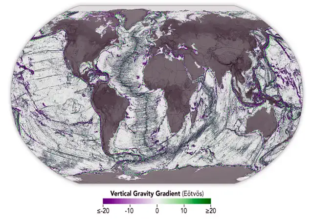 Mapa global del océano del mundo se superpone con información de gravedad que indica la ubicación de depresiones (violeta) y características elevadas (verde) en el fondo marino. Foto: NASA Mapa global del océano del mundo se superpone con información de gravedad que indica la ubicación de depresiones (violeta) y características elevadas (verde) en el fondo marino. Foto: NASA