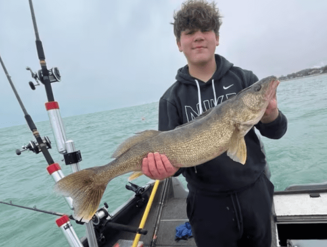 Luke Efantis with the 14-year-old walleye he caught on Lake Michigan. Photo: Chicago Sun Times Luke Efantis with the 14-year-old walleye he caught on Lake Michigan. Photo: Chicago Sun Times