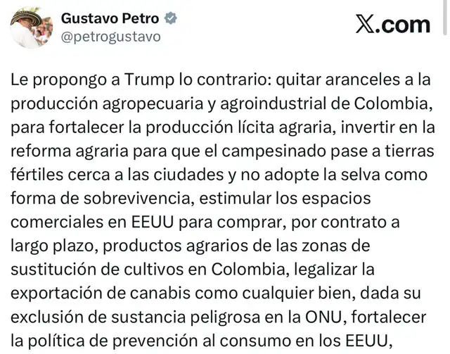 Gustavo Petro y John T. McNamara en una reunión en Bogotá