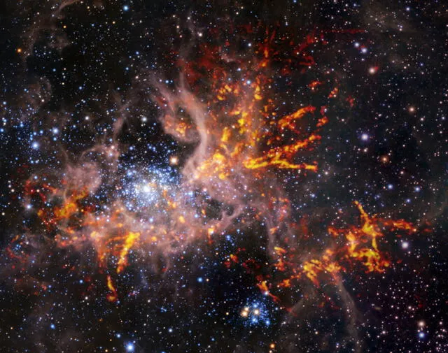 Imagen de junio del 2022 de la Nebulosa de la  Tarántula. La postal fue compuesta por observaciones del Very Large Telescope (VLT) de la ESO y la matriz de radiotelescopios ALMA. Foto: ESO / ALMA