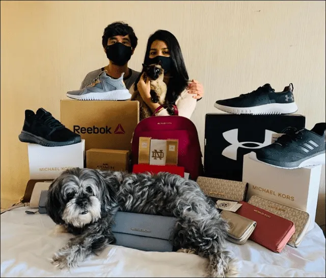 Leonid y su novia, Aixa, posando con sus mascotas y los productos importados. (Foto: Leonid Llanto)