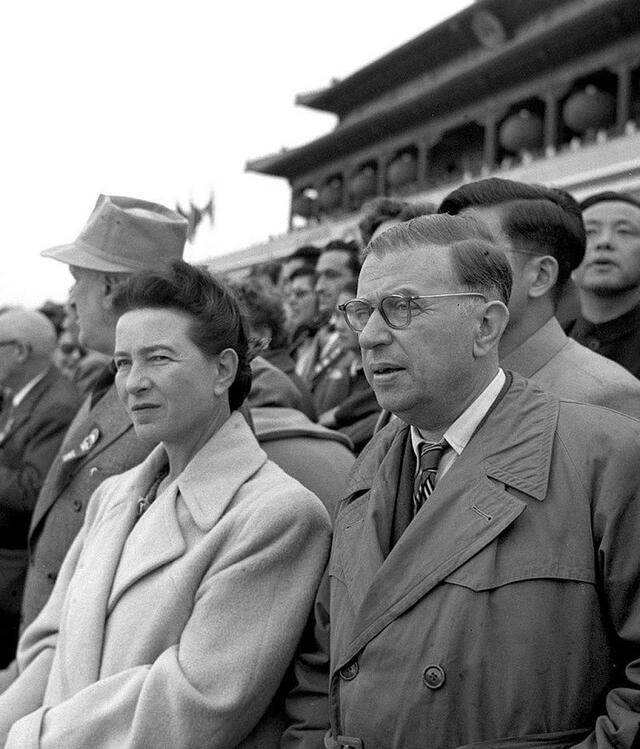   Jean-Paul Sartre and Simone de Beauvoir at the 6th anniversary of the founding of communist China in Tiananmen Square.  Photo: Liu Dong'ao - Xinhua News Agency    